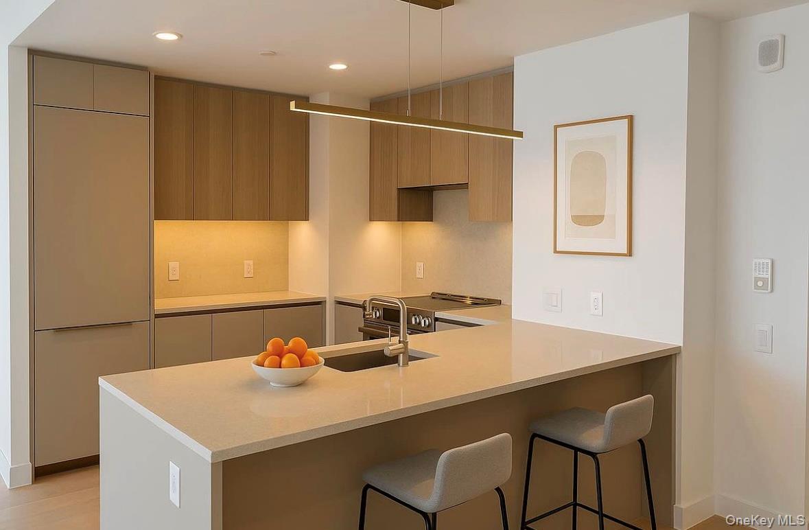 a bathroom with a sink a table and chairs
