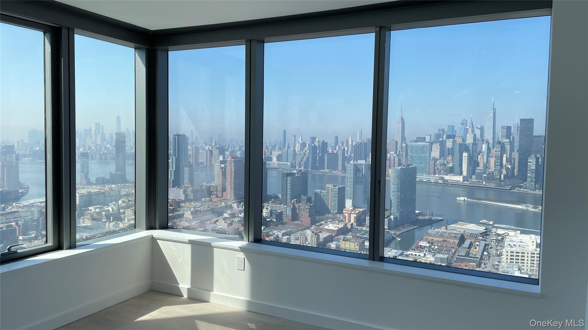 3 Court Square, Unit 5211 Queens, NY 11101 - Photo 5 of 13 a view of a room and window