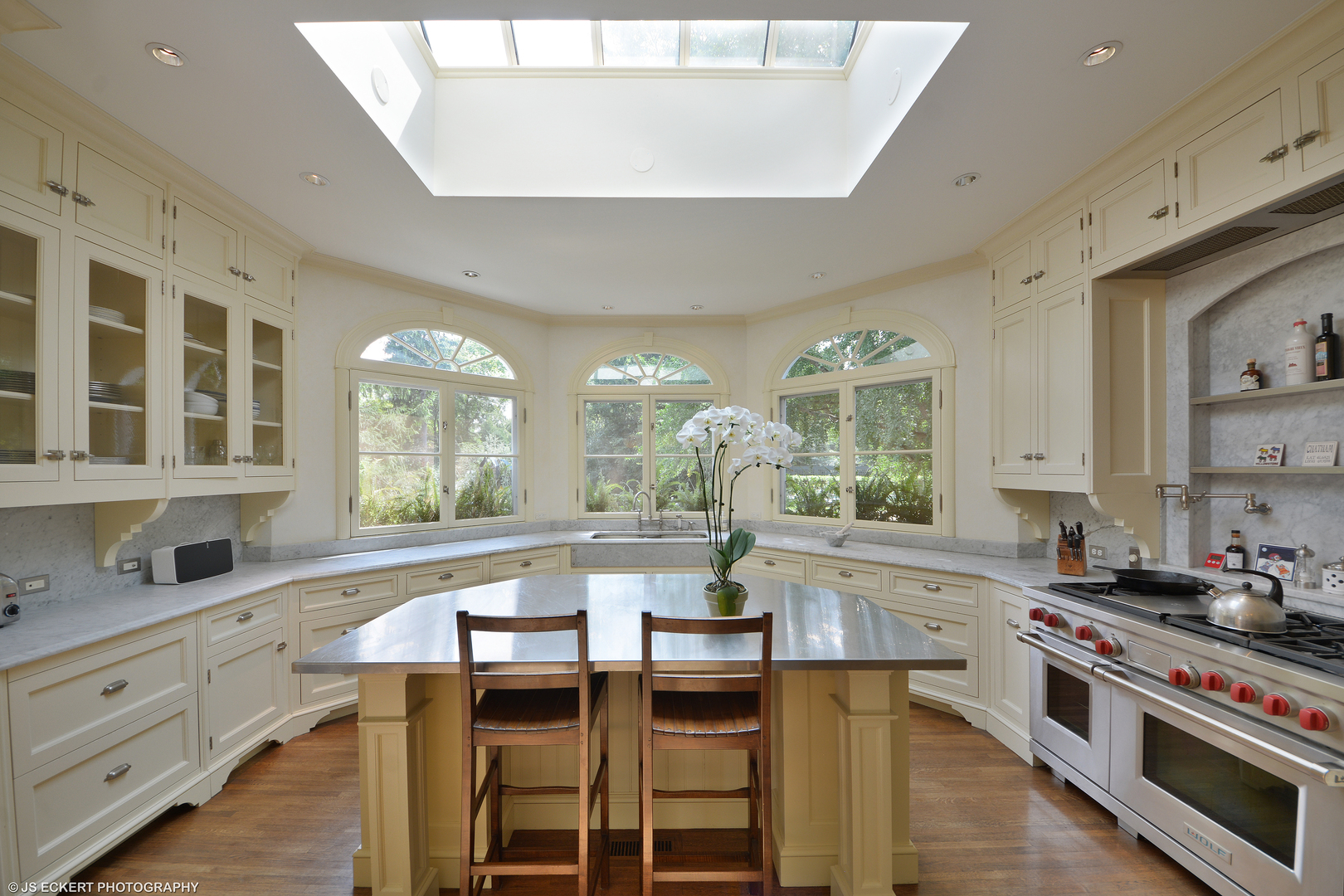1035 North Sheridan Road Lake Forest, IL 60045 - Photo 18 of 47 a kitchen with stainless steel appliances granite countertop a stove and a sink
