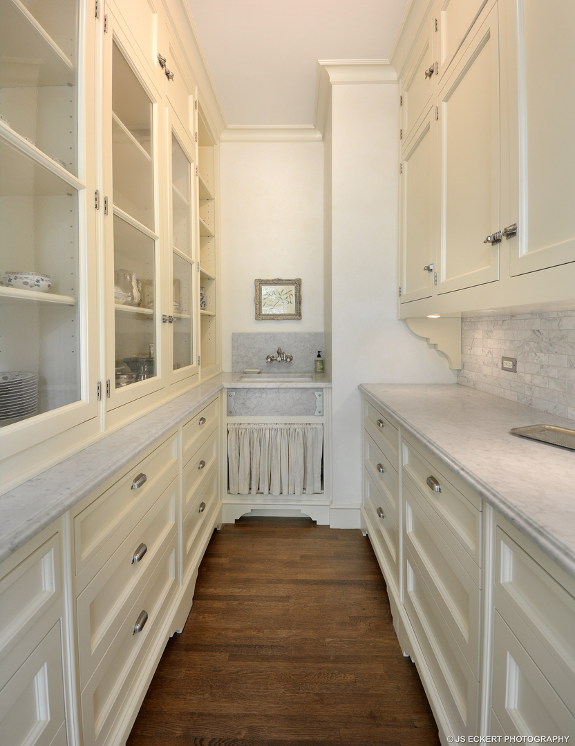 1035 North Sheridan Road Lake Forest, IL 60045 - Photo 20 of 47 a spacious bathroom with double vanity and mirrors