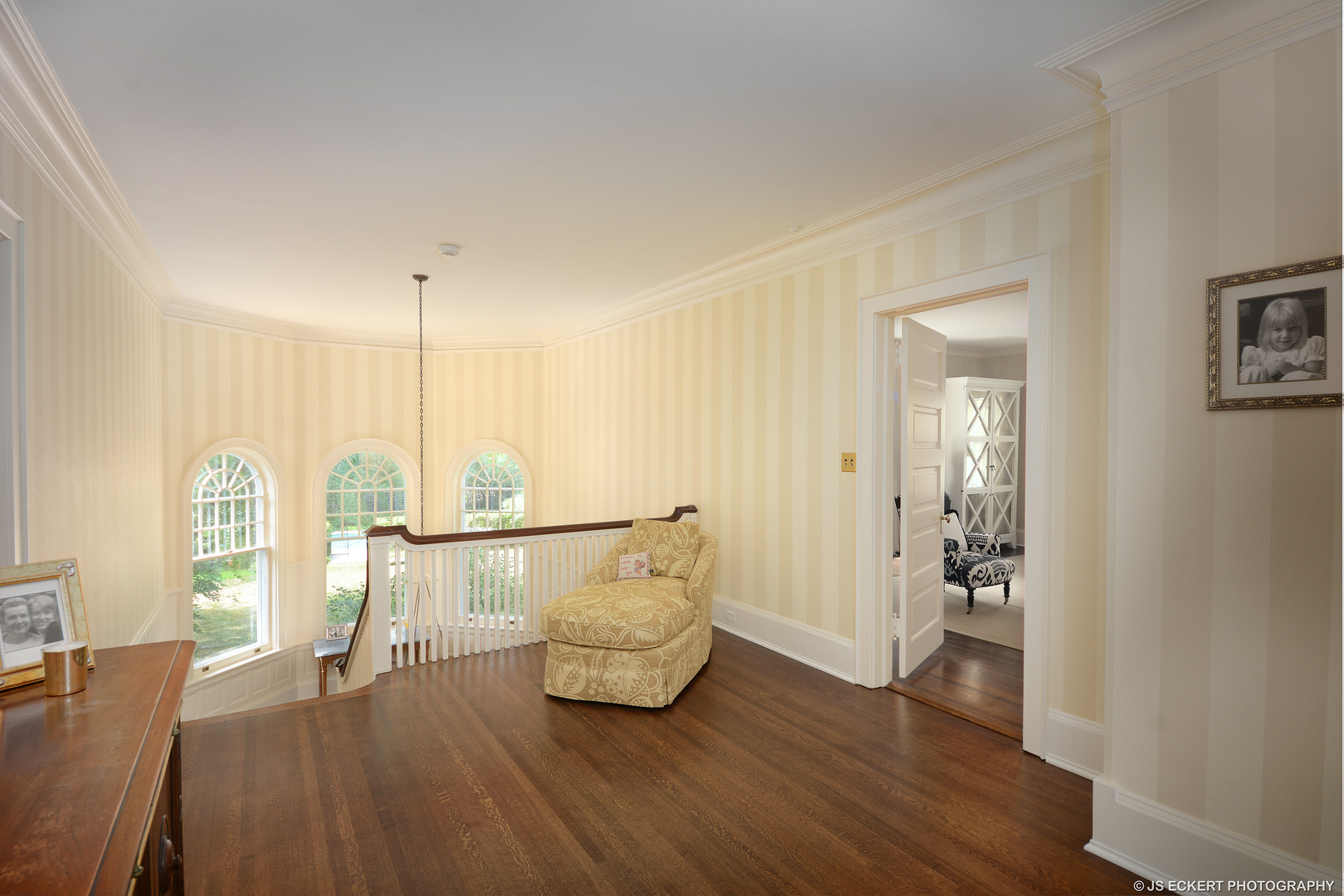 1035 North Sheridan Road Lake Forest, IL 60045 - Photo 24 of 47 a view of an empty room and window with wooden floor