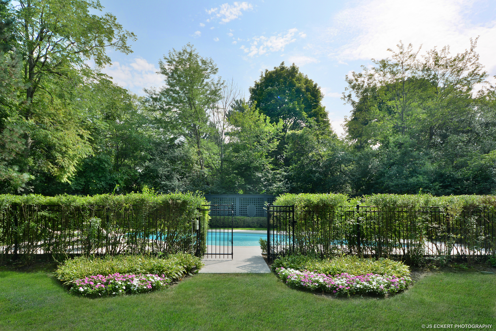 1035 North Sheridan Road Lake Forest, IL 60045 - Photo 3 of 47 a view of a garden with a fountain