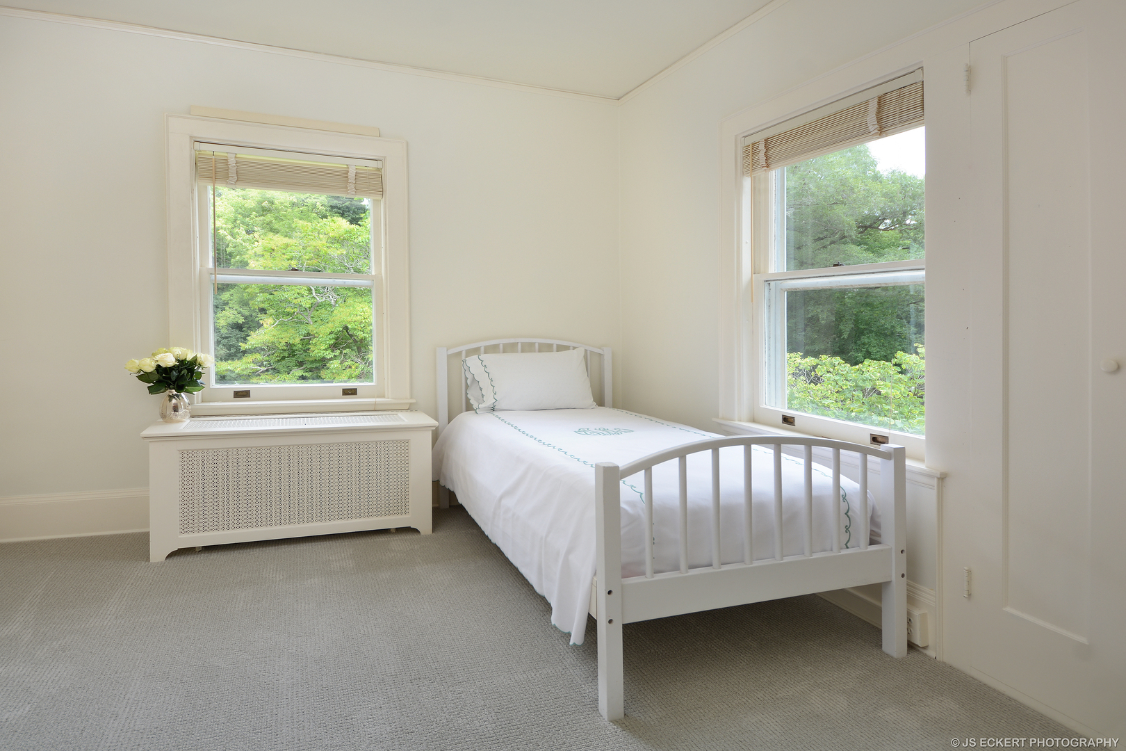 1035 North Sheridan Road Lake Forest, IL 60045 - Photo 40 of 47 a spacious bedroom with a bed and window