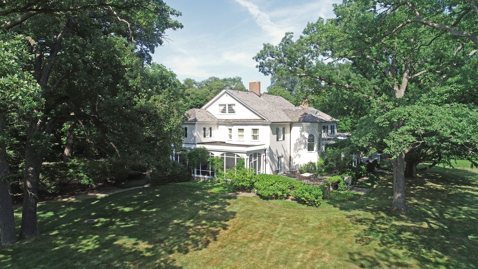 1035 North Sheridan Road Lake Forest, IL 60045 - Photo 46 of 47 a front view of a house with a yard