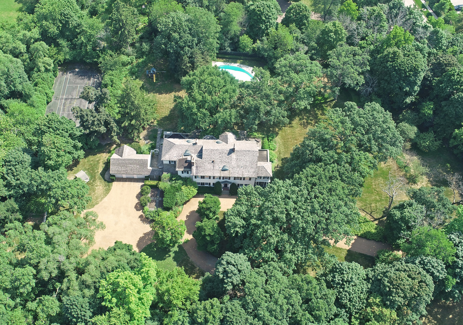 1035 North Sheridan Road Lake Forest, IL 60045 - Photo 47 of 47 an aerial view of a house with a yard and lake view