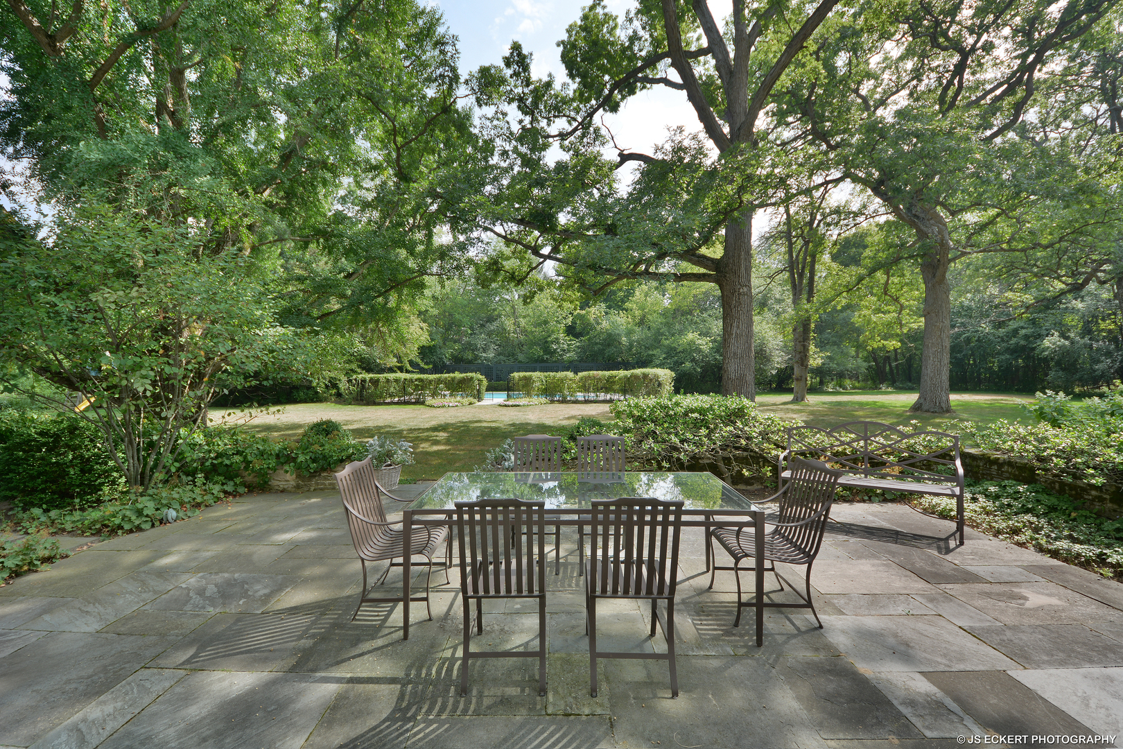 1035 North Sheridan Road Lake Forest, IL 60045 - Photo 5 of 47 a view of a table and chairs and couches in the patio