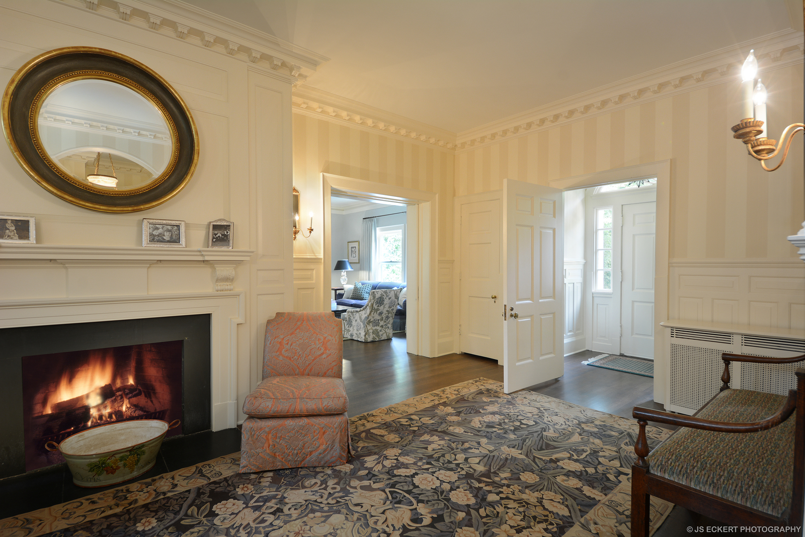 1035 North Sheridan Road Lake Forest, IL 60045 - Photo 6 of 47 a living room with furniture a rug and a fireplace