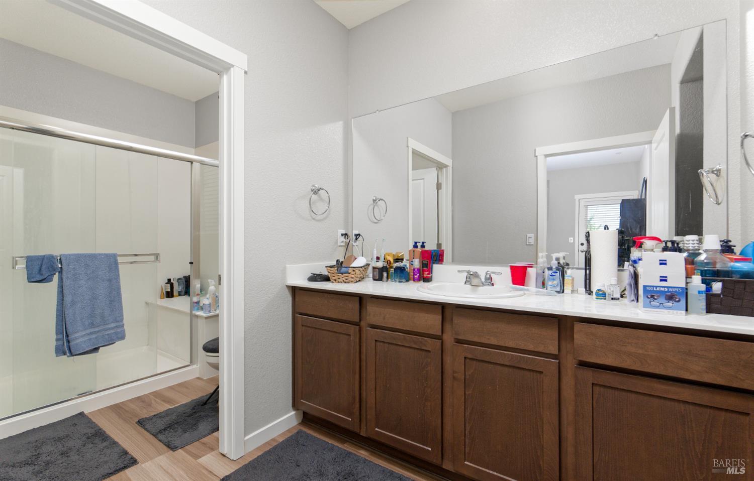 2211 Stars Drive Rio Vista, CA 94571 - Photo 18 of 24 a bathroom with a sink and a mirror