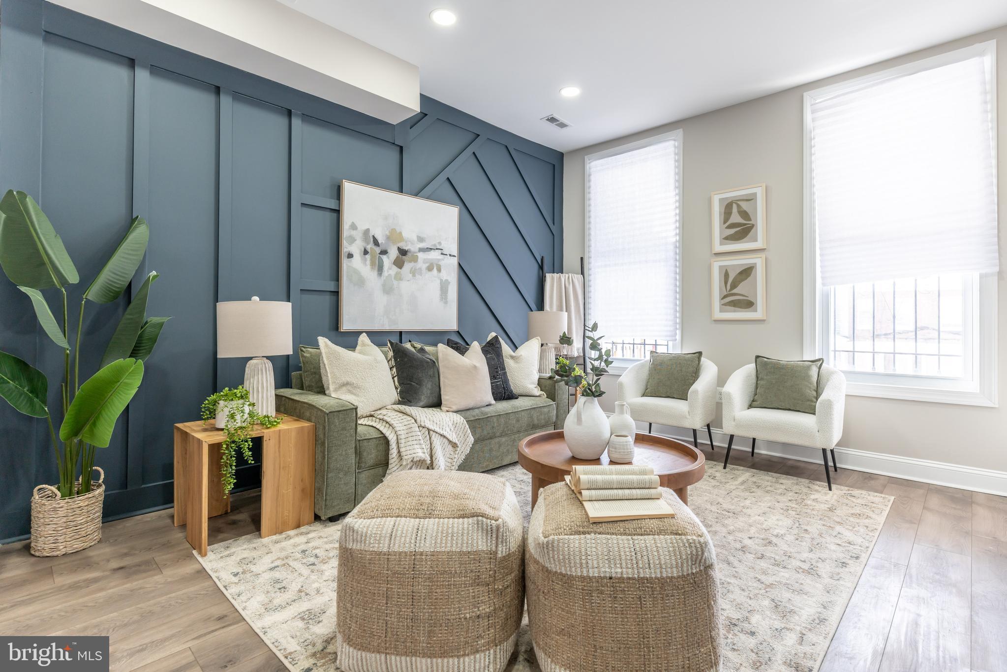 3651 Cottage Avenue Baltimore, MD 21215 - Photo 18 of 38 a living room with furniture and wooden floor