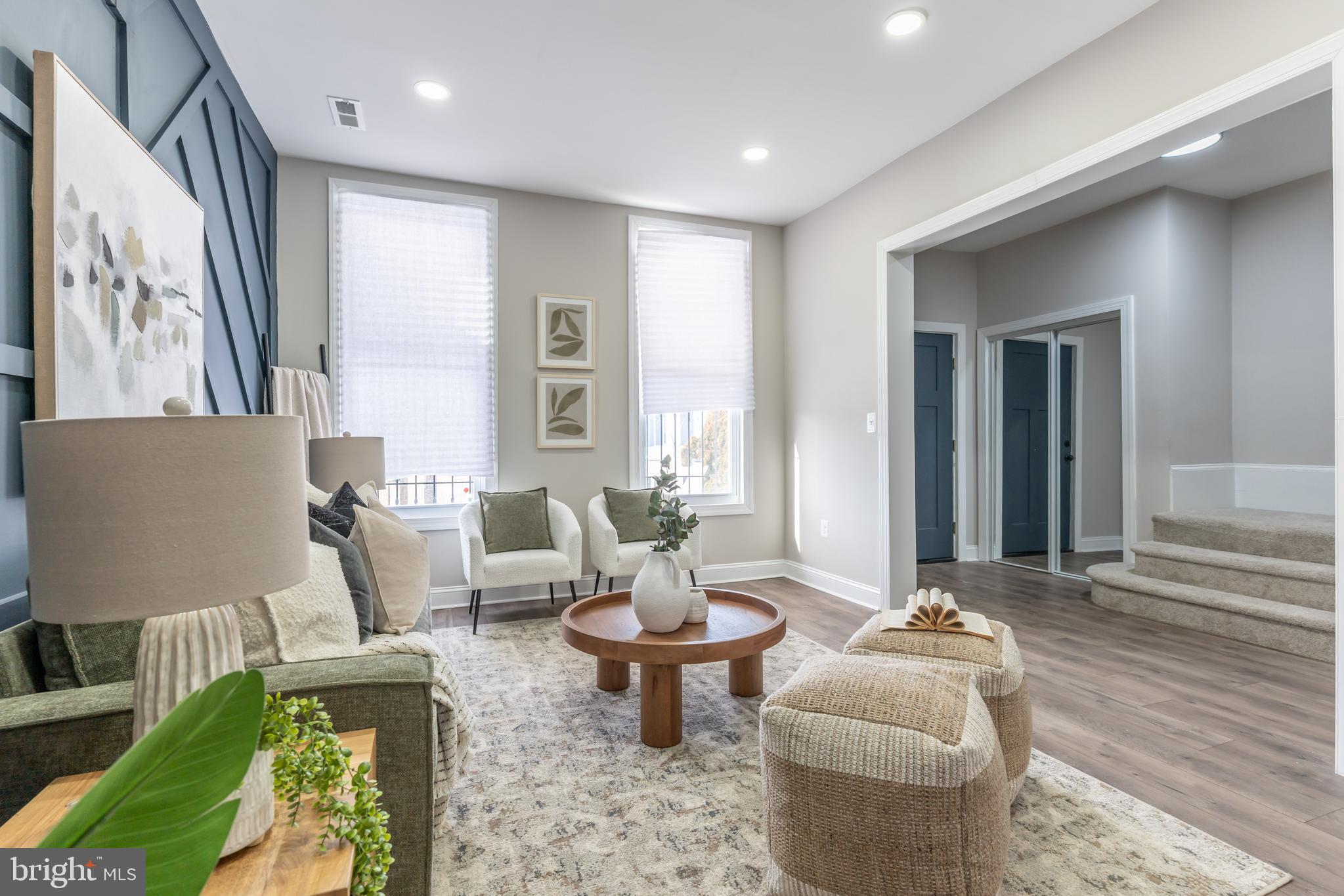 3651 Cottage Avenue Baltimore, MD 21215 - Photo 19 of 38 a living room with furniture and a large window