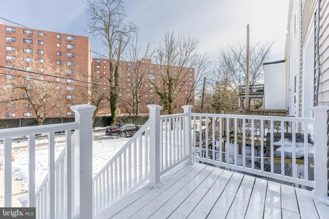 a view of a wooden roof deck