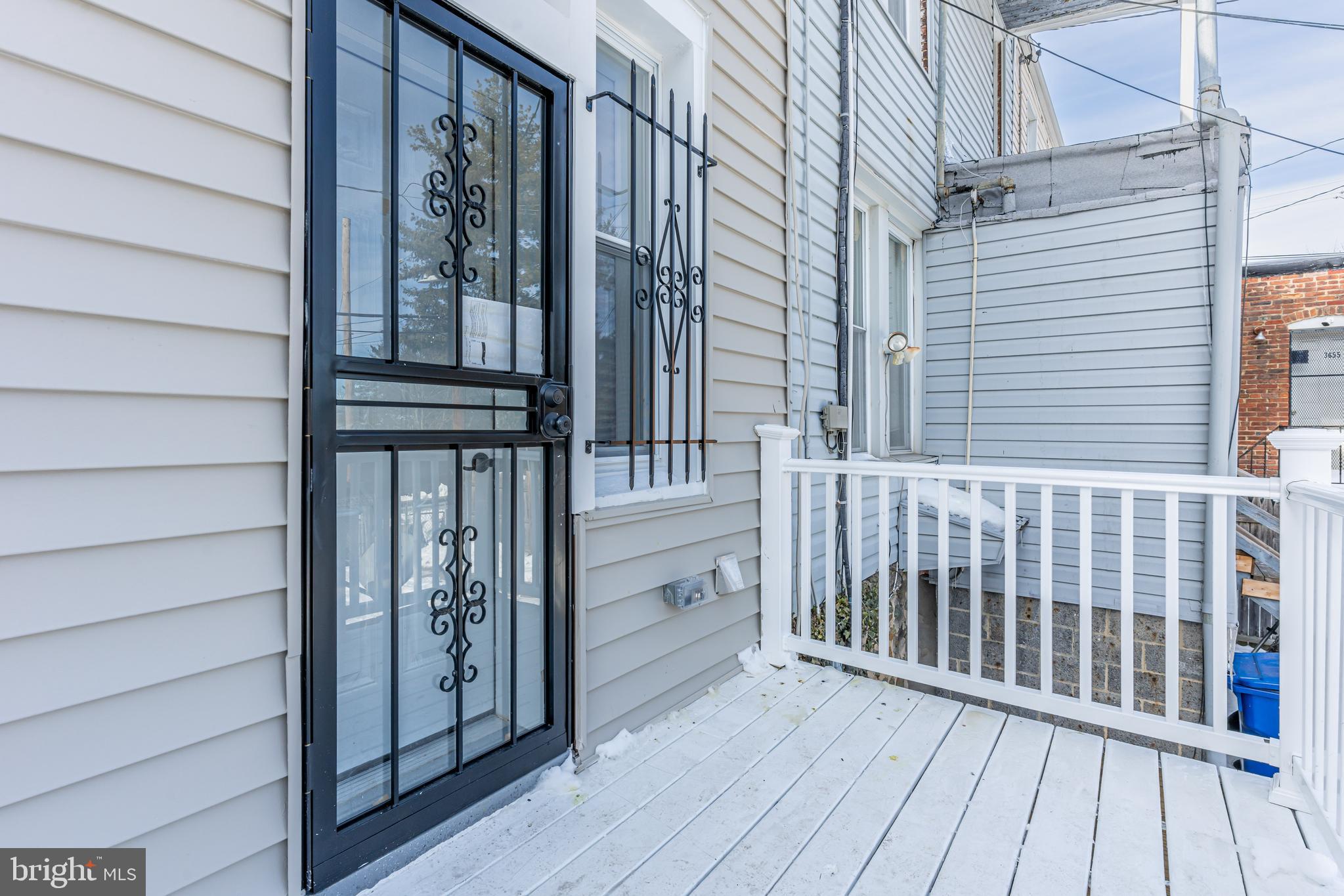 3651 Cottage Avenue Baltimore, MD 21215 - Photo 32 of 38 a view of wooden balcony
