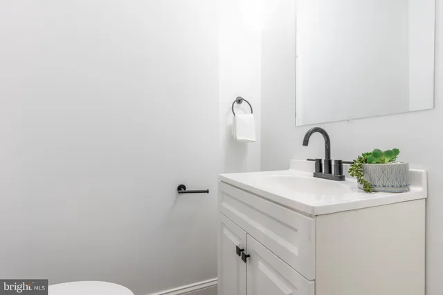 a bathroom with a sink and a toilet