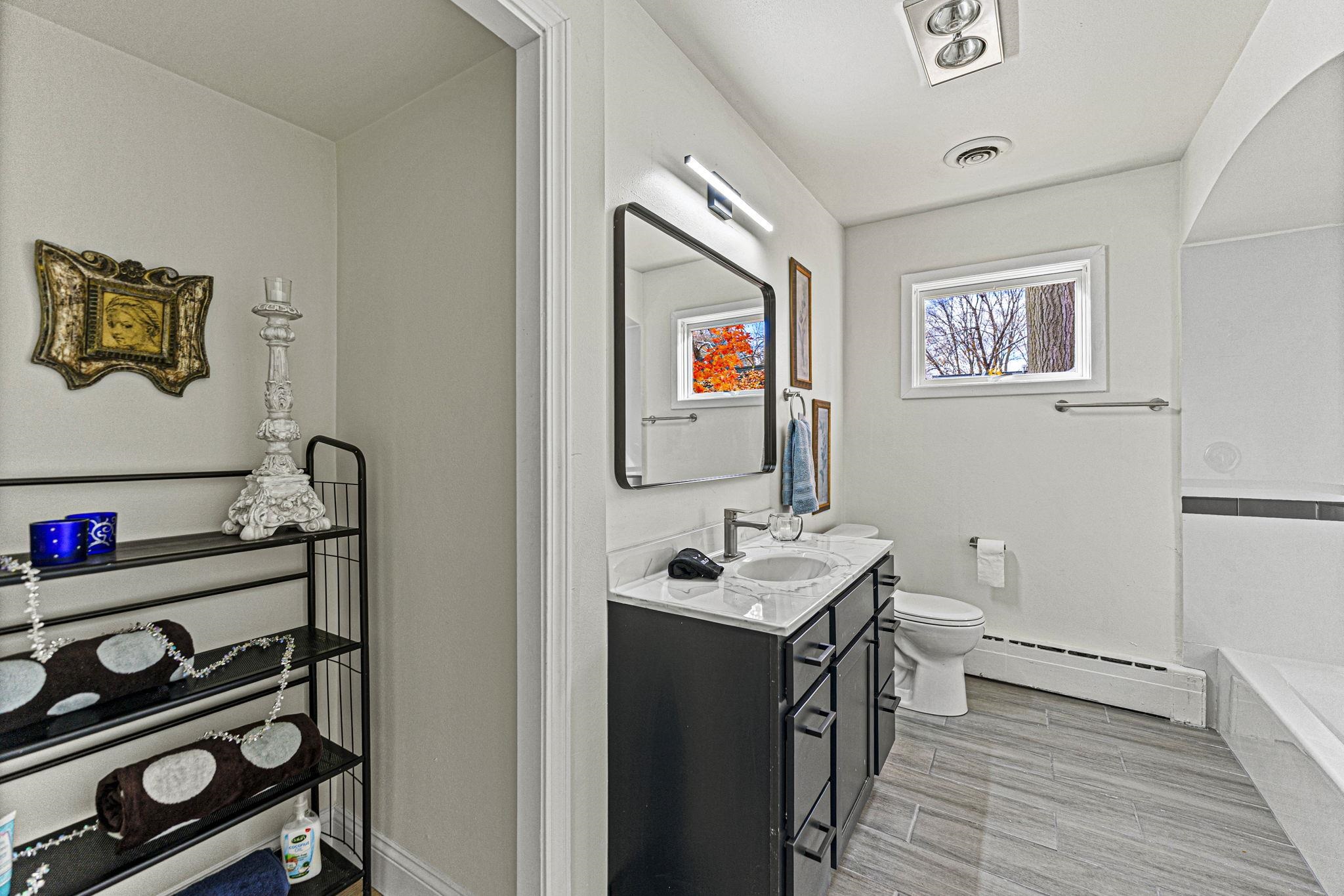 2915 Rural Street Rockford, IL 61107 - Photo 27 of 42 a bathroom with a sink and a mirror