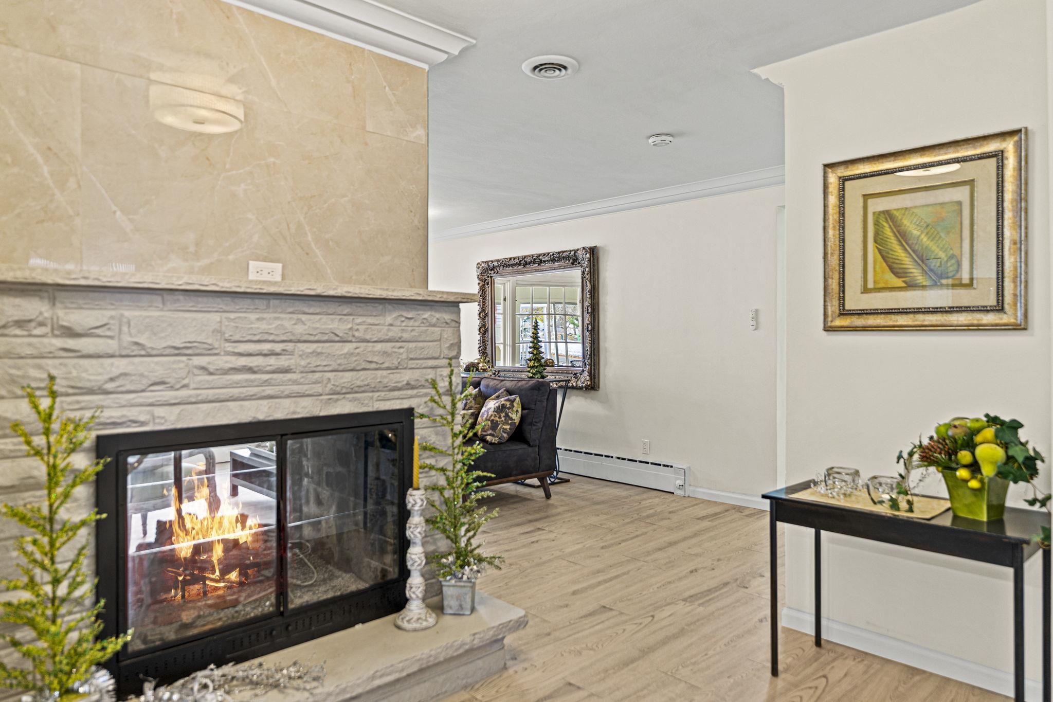 2915 Rural Street Rockford, IL 61107 - Photo 10 of 42 a living room with furniture and a fireplace