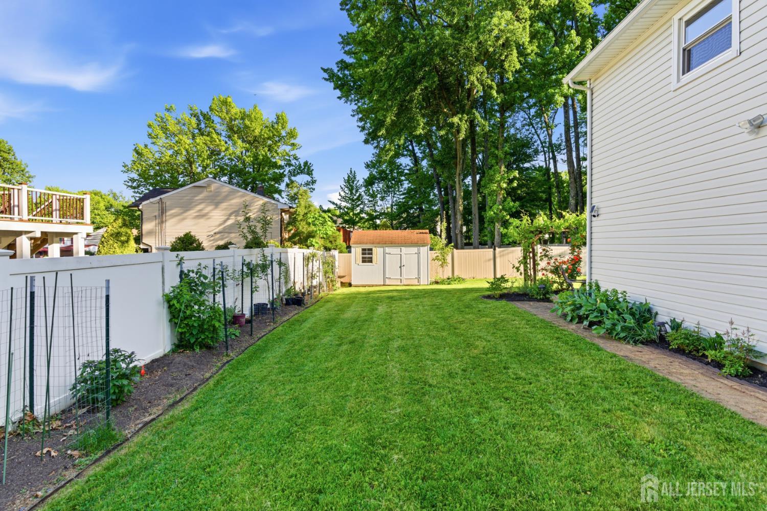5 McKinley Street Edison, NJ 08820 - Photo 36 of 38 a view of a house with a yard