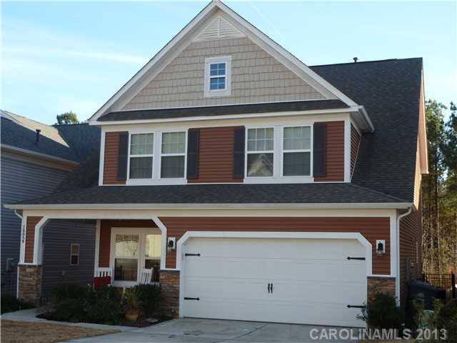78059 Rillstone Drive Lancaster, SC 29720 - Photo 1 of 16 a front view of a house with yard