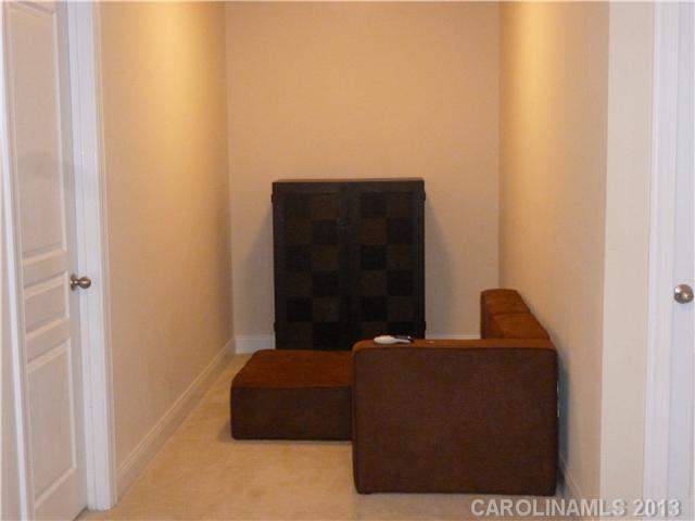 78059 Rillstone Drive Lancaster, SC 29720 - Photo 12 of 16 a living room with a couch and a stove
