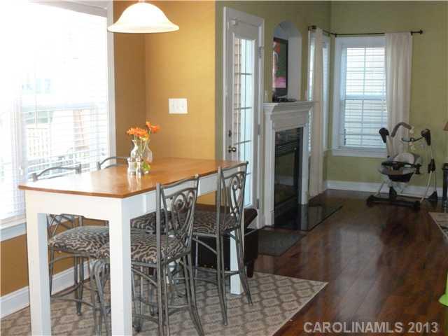 78059 Rillstone Drive Lancaster, SC 29720 - Photo 5 of 16 a dining room with furniture and wooden floor