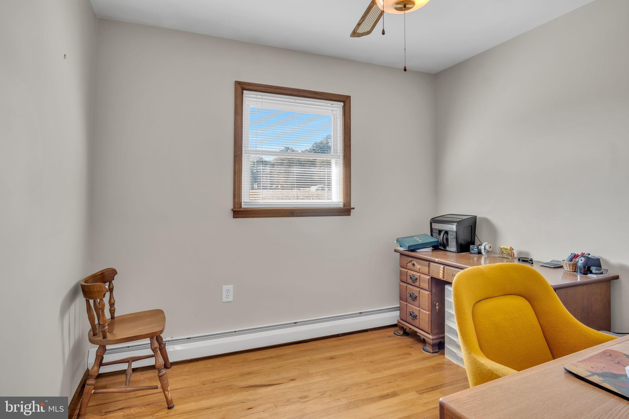 1325 Goodyear Road Gardners, PA 17324 - Photo 18 of 39 a view of a workspace with furniture and wooden floor