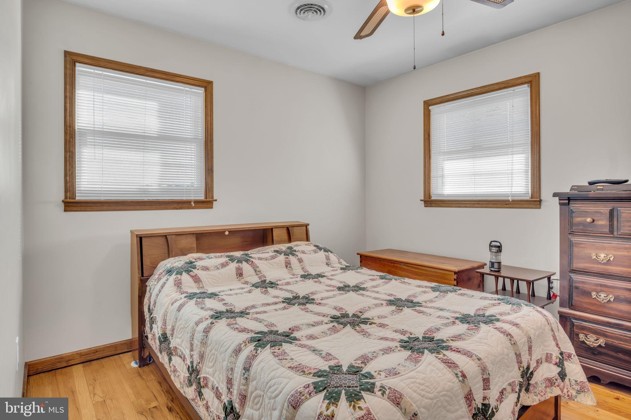 1325 Goodyear Road Gardners, PA 17324 - Photo 19 of 39 a bedroom with a bed and wooden floor