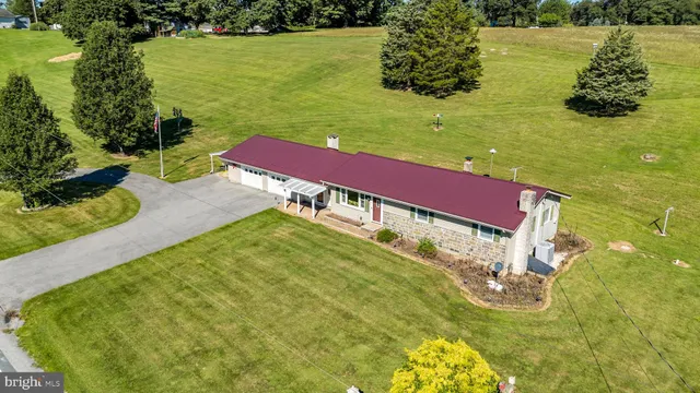 a view of a lake with a yard