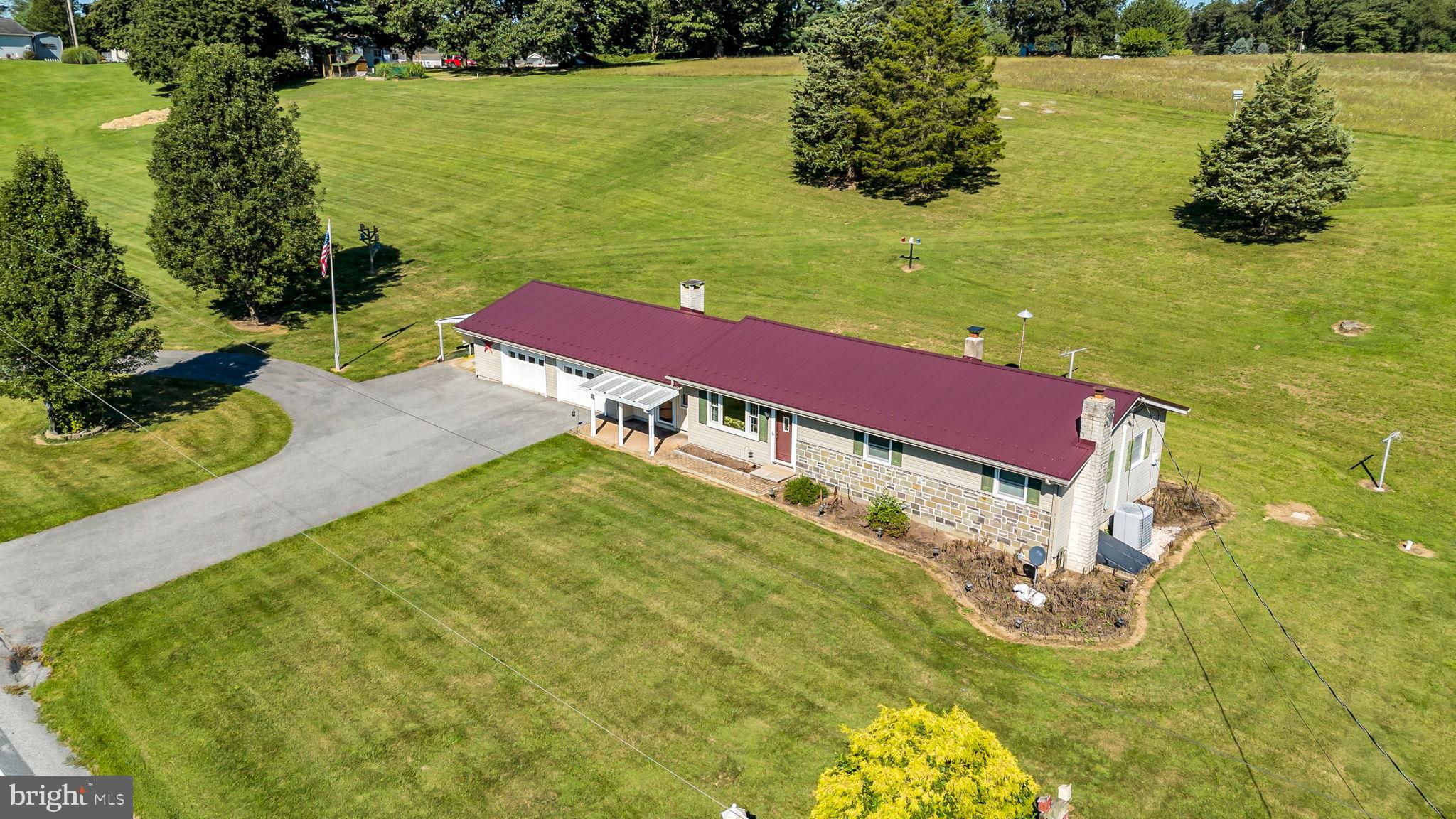 1325 Goodyear Road Gardners, PA 17324 - Photo 4 of 39 a view of a lake with a yard