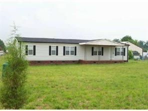 8302 Smith Road Kannapolis, NC 28081 - Photo 1 of 1 a view of a house with a backyard