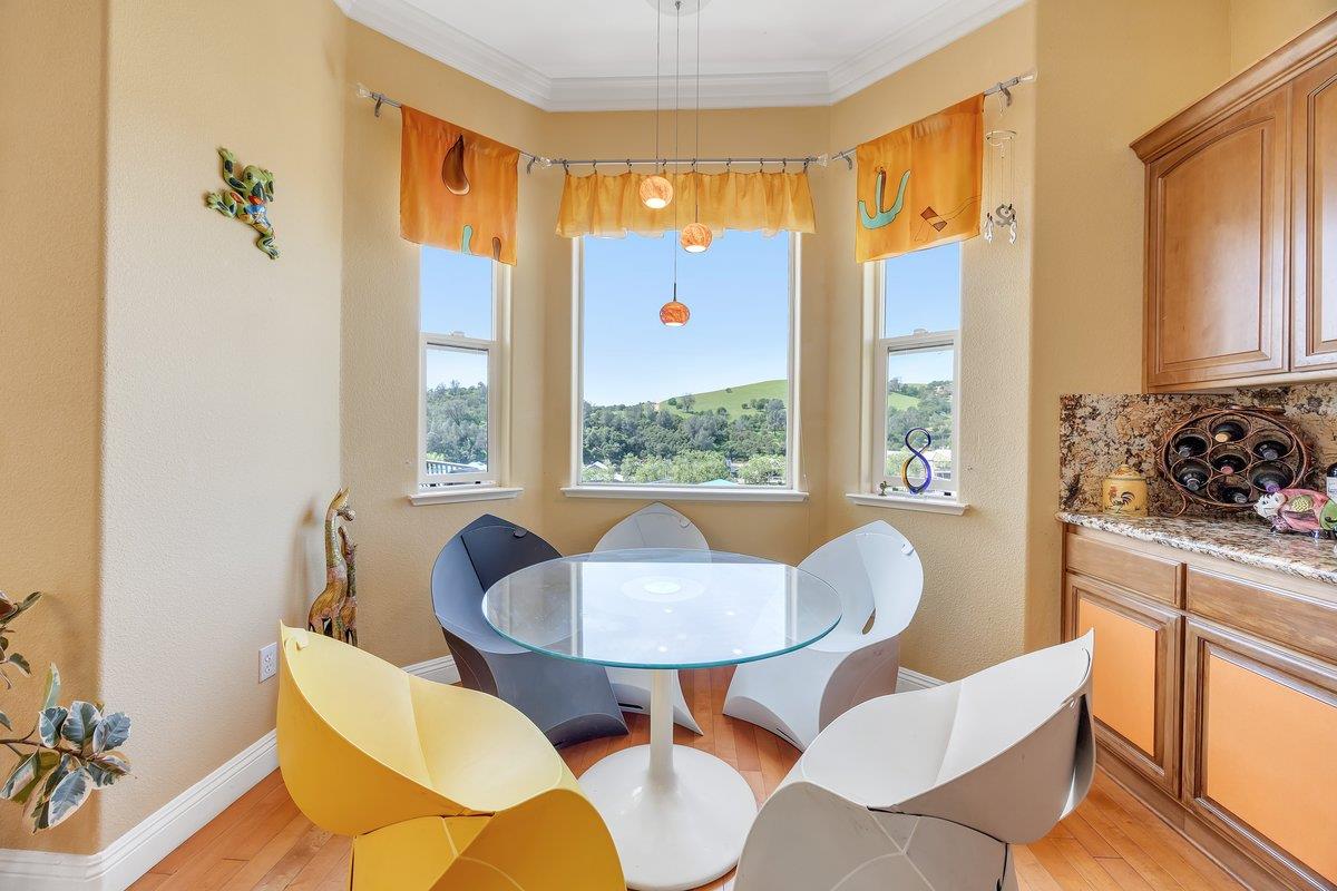33 Aurora Lane Copperopolis, CA 95228 - Photo 12 of 46 dining space with light wood-type flooring and ornamental molding