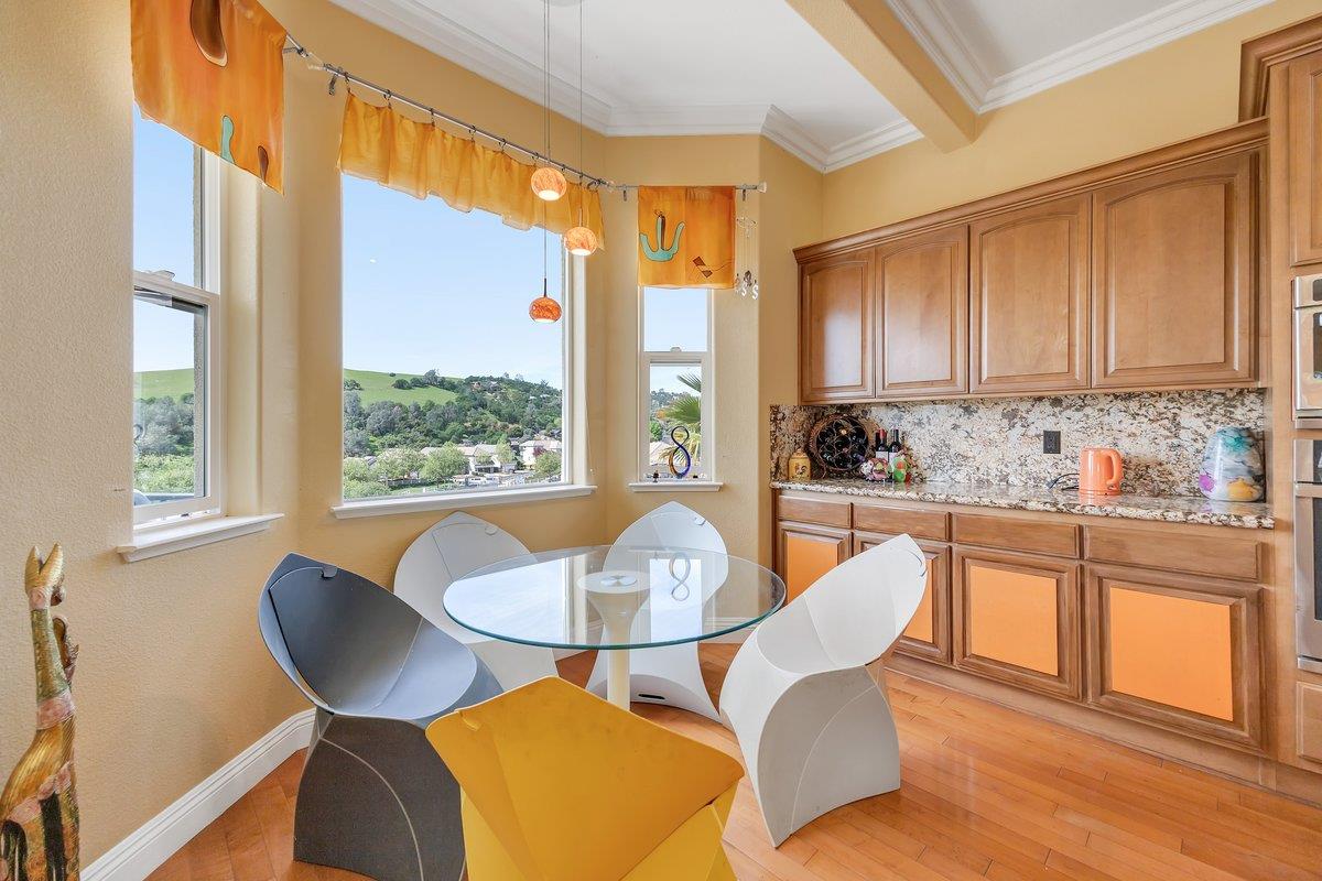 33 Aurora Lane Copperopolis, CA 95228 - Photo 15 of 46 dining space with light wood-style floors and ornamental molding