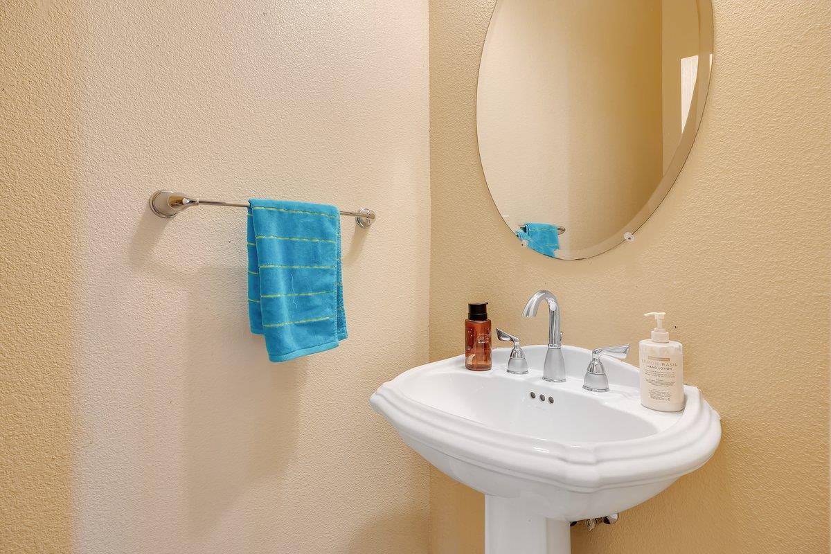 33 Aurora Lane Copperopolis, CA 95228 - Photo 20 of 46 bathroom with a textured wall and pedestal sink