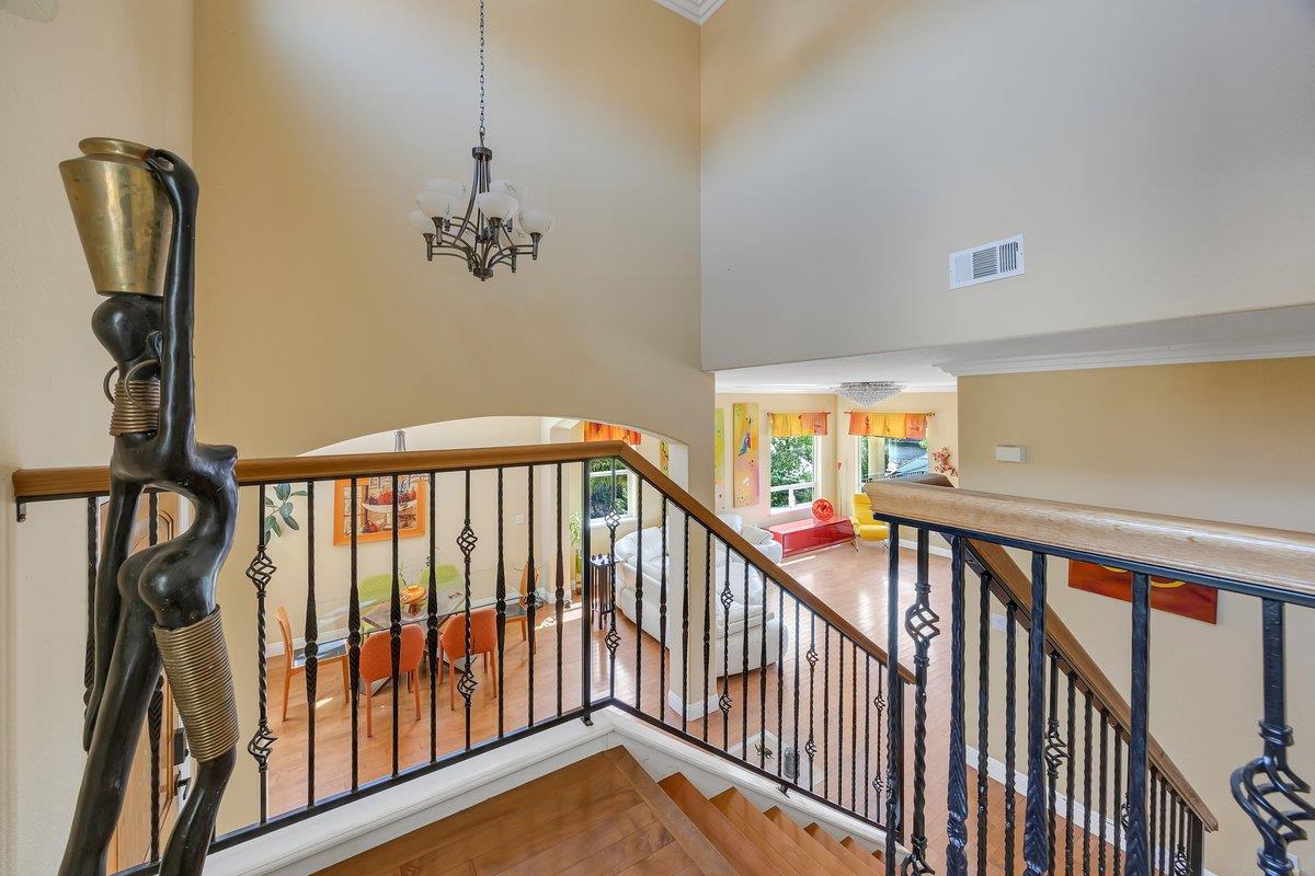 33 Aurora Lane Copperopolis, CA 95228 - Photo 29 of 46 stairway featuring crown molding and a high ceiling