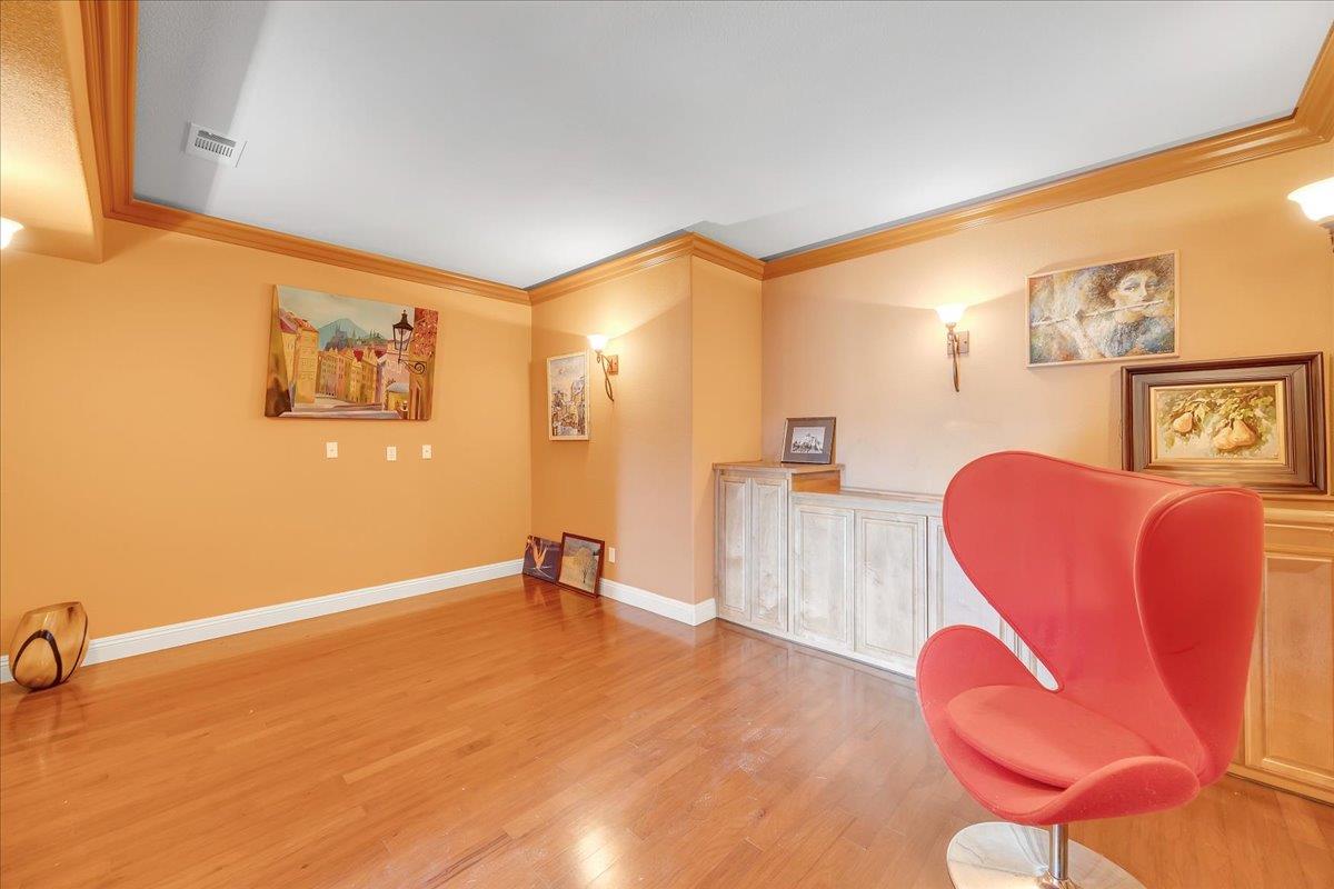 33 Aurora Lane Copperopolis, CA 95228 - Photo 32 of 46 media room featuring ornamental molding and light wood-style flooring