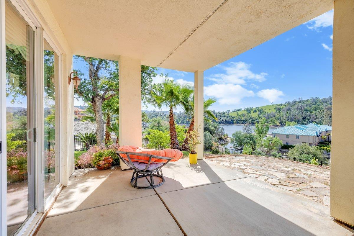 33 Aurora Lane Copperopolis, CA 95228 - Photo 39 of 46 view of patio / terrace featuring a lake view