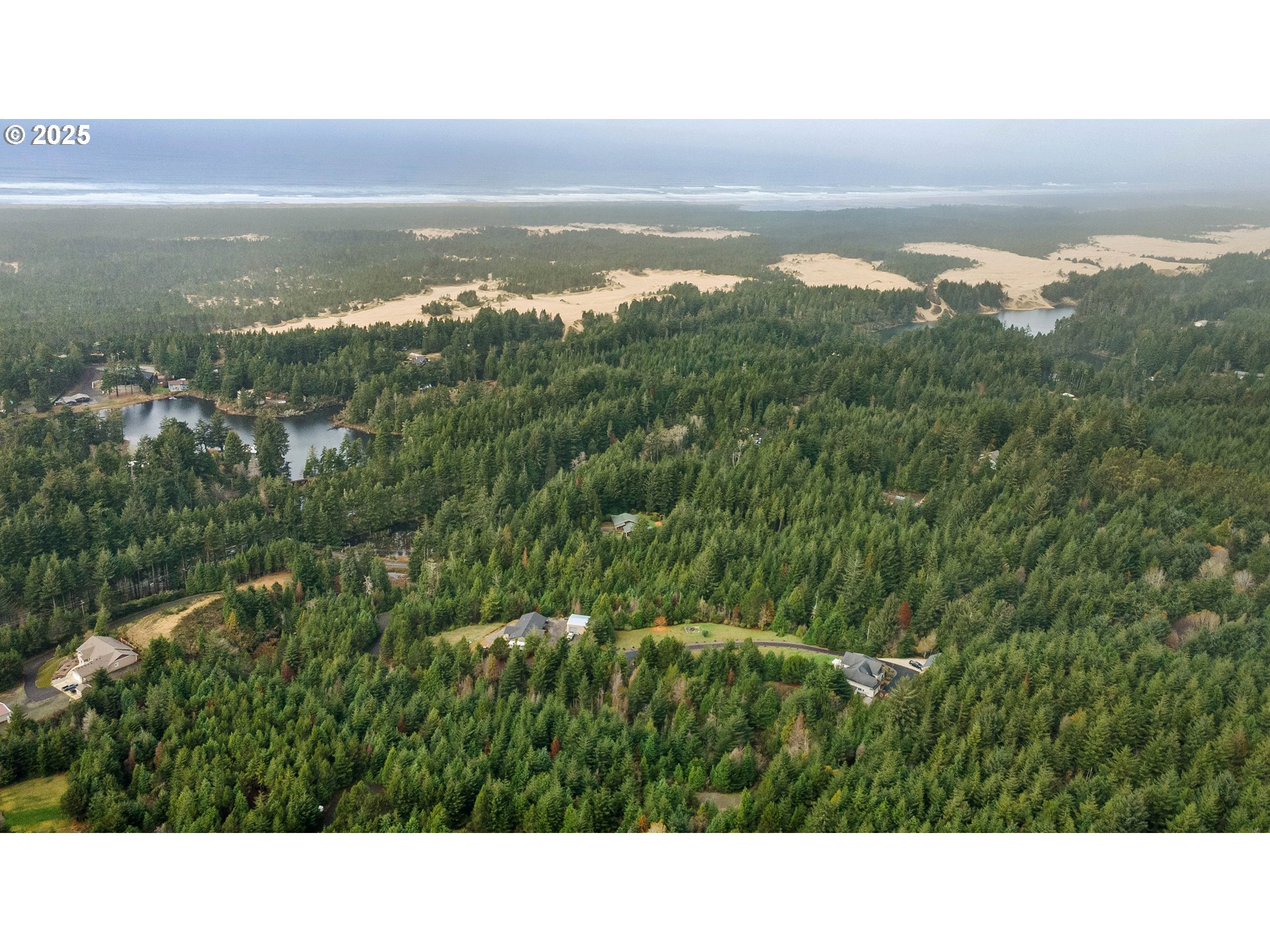 0 Beaver Loop Road North Bend, OR 97459 - Photo 11 of 16 a view of a city with an ocean