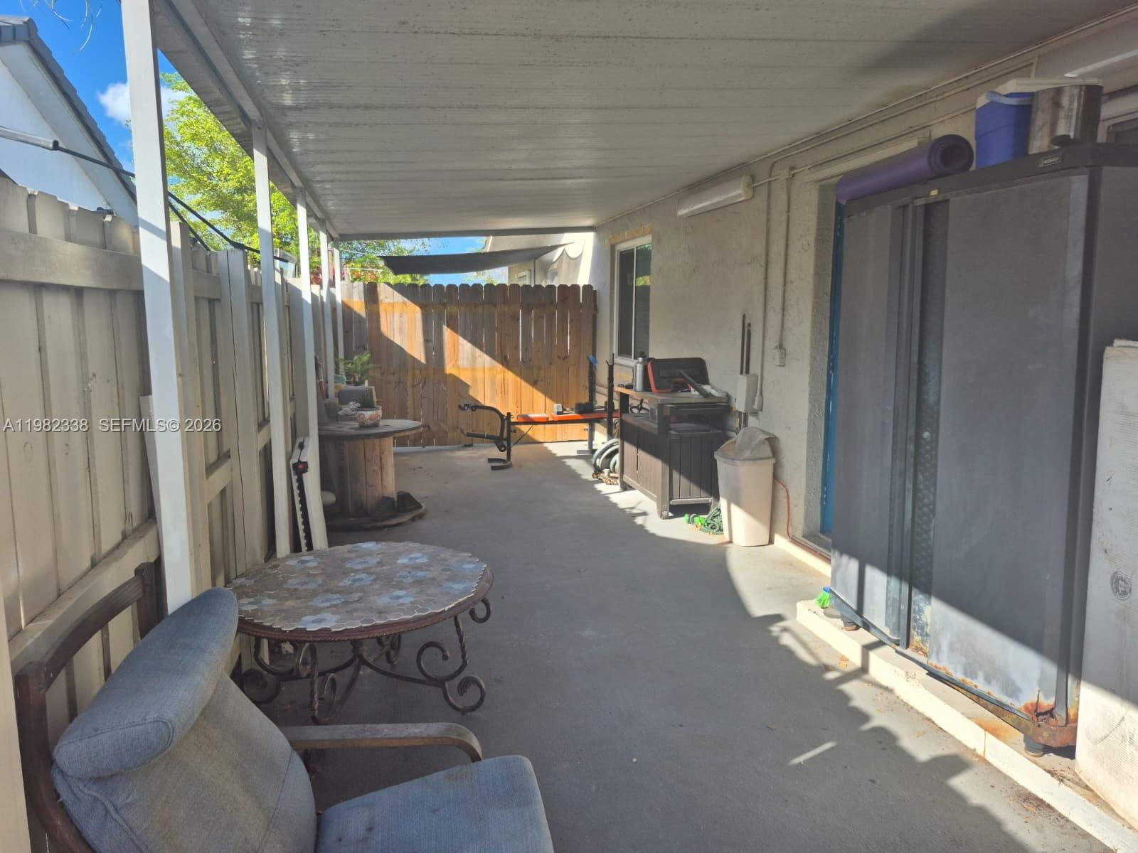 14530 Southwest 110th Street Miami, FL 33186 - Photo 36 of 45 a view of balcony and patio