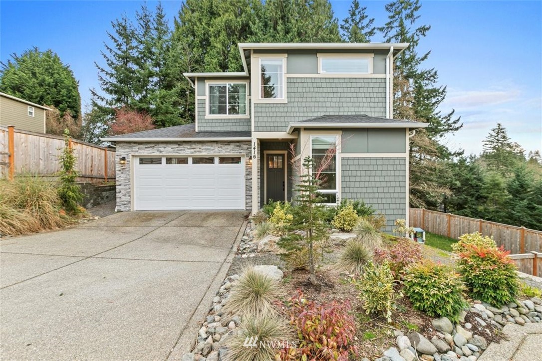 1416 242nd Place Southeast Bothell, WA 98021 - Photo 2 of 39 front view of a house