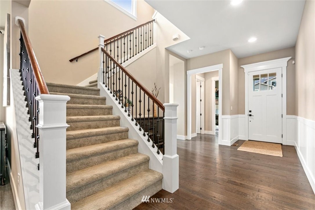 1416 242nd Place Southeast Bothell, WA 98021 - Photo 4 of 39 a view of an entryway with wooden floor