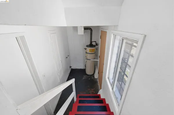 a view of entryway with furniture and stairs