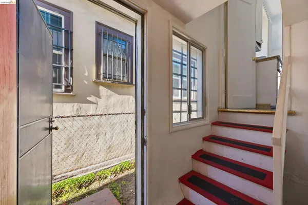 a view of entryway with a front door