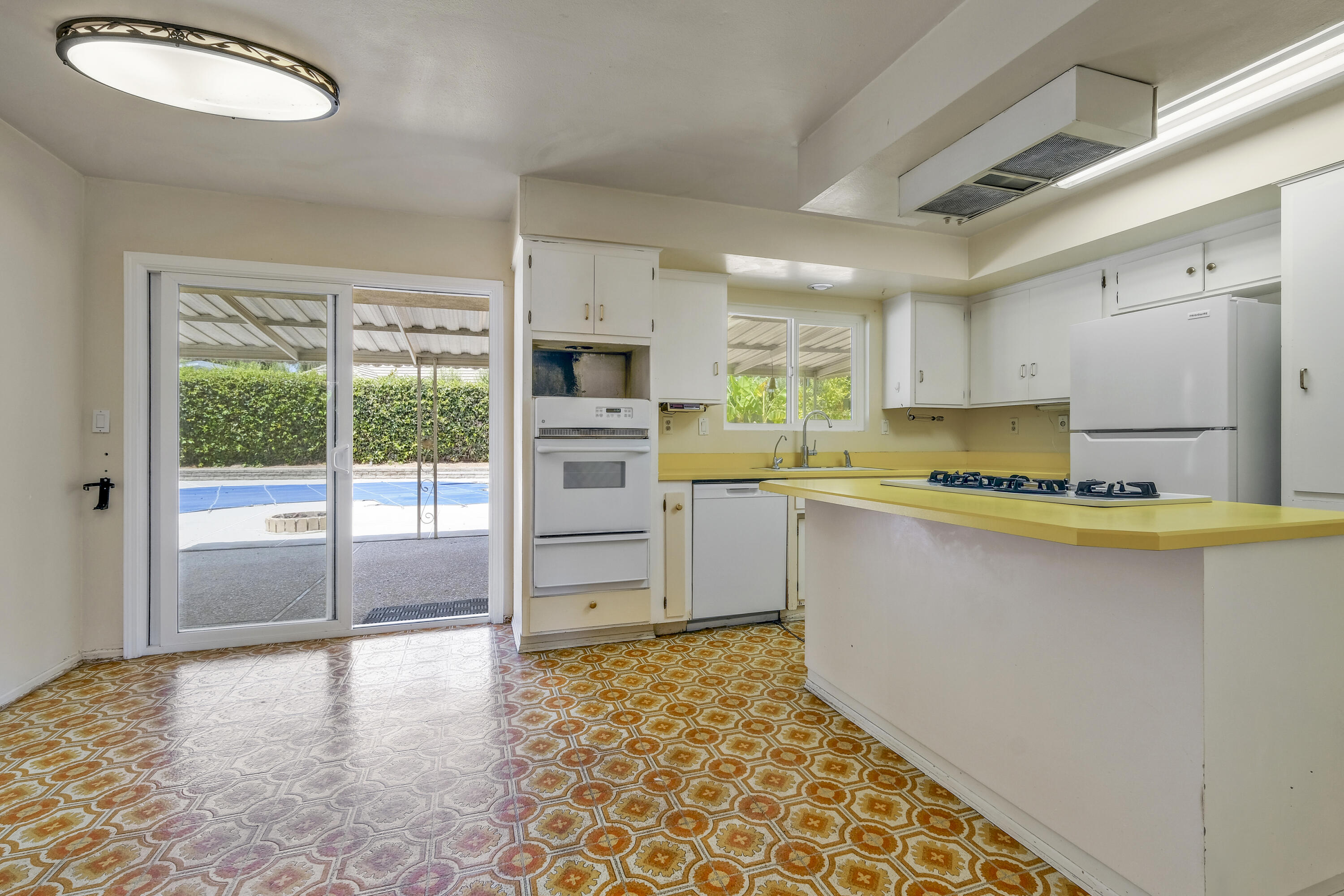 5376 Berkeley Road Santa Barbara, CA 93111 - Photo 5 of 18 a kitchen with stainless steel appliances granite countertop a stove a sink and a refrigerator