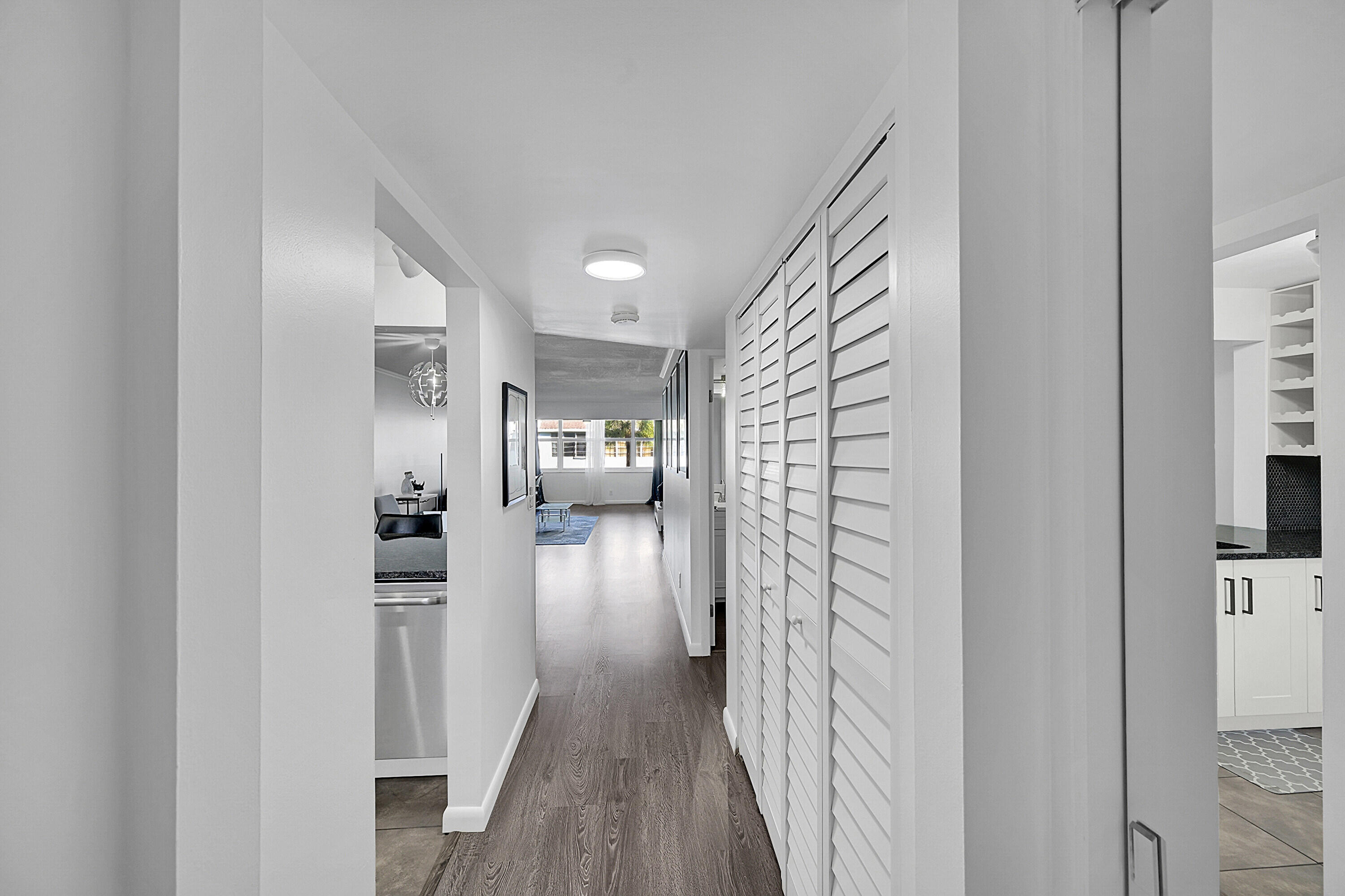 2920 Southwest 22nd Avenue, Unit 6040 Delray Beach, FL 33445 - Photo 47 of 53 a view of hallway with wooden floor