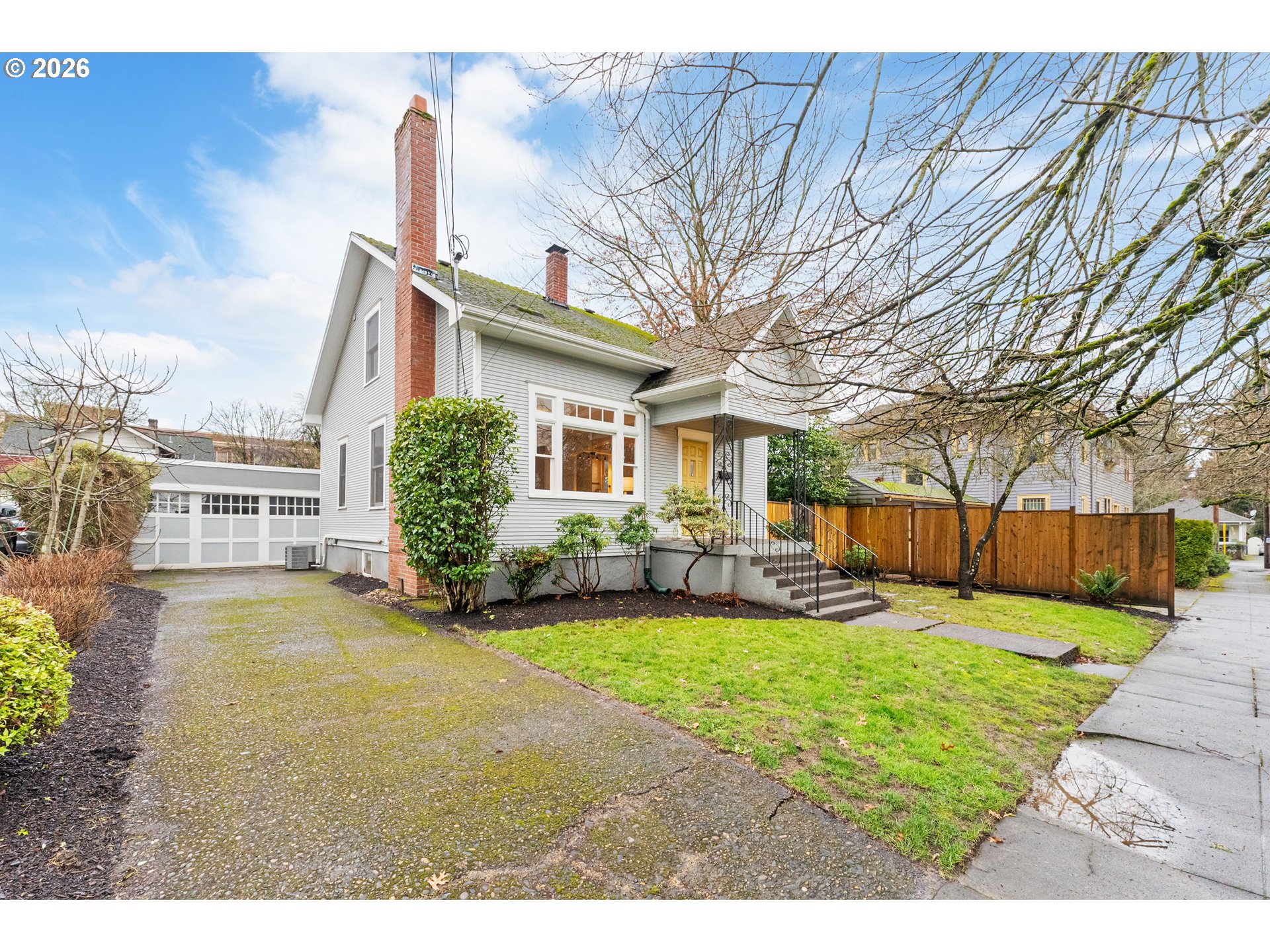 2624 Southeast Kelly Street Portland, OR 97202 - Photo 2 of 36 a view of a house with a patio