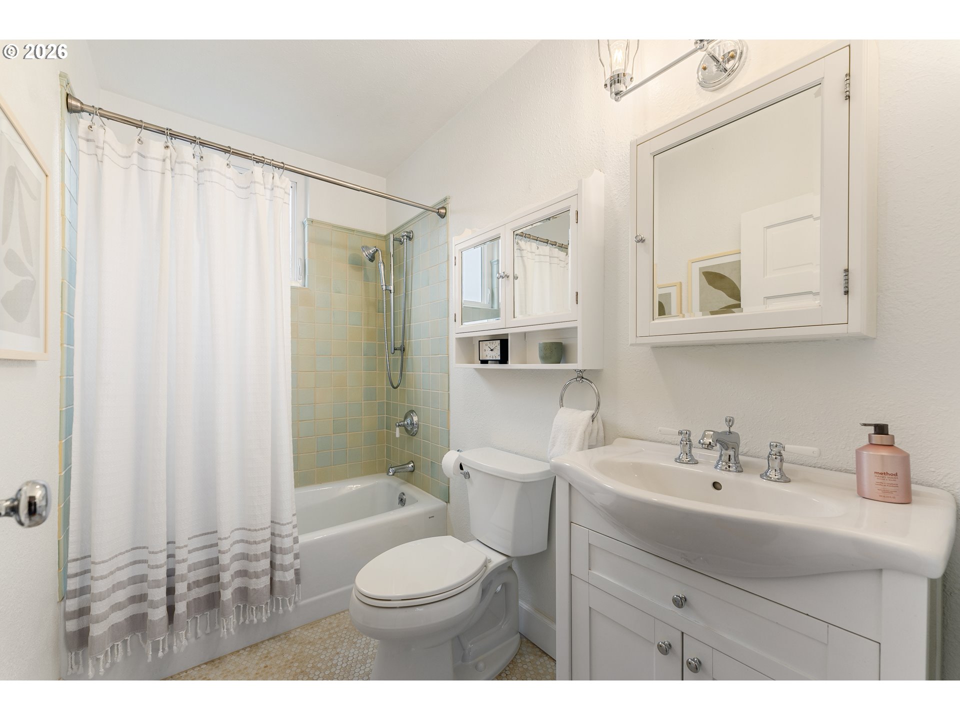 2624 Southeast Kelly Street Portland, OR 97202 - Photo 21 of 36 a bathroom with a sink a toilet and shower
