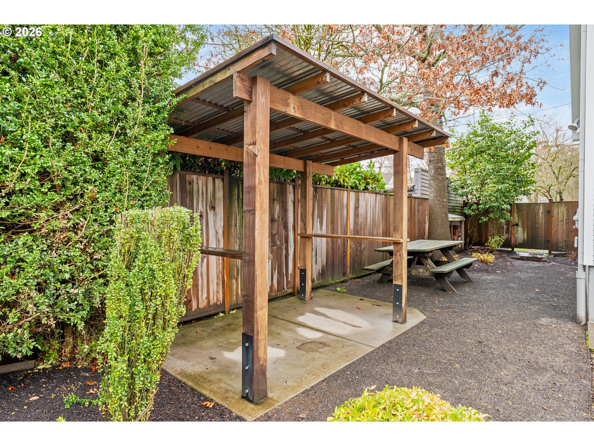 2624 Southeast Kelly Street Portland, OR 97202 - Photo 28 of 36 a view of a patio with table and chairs