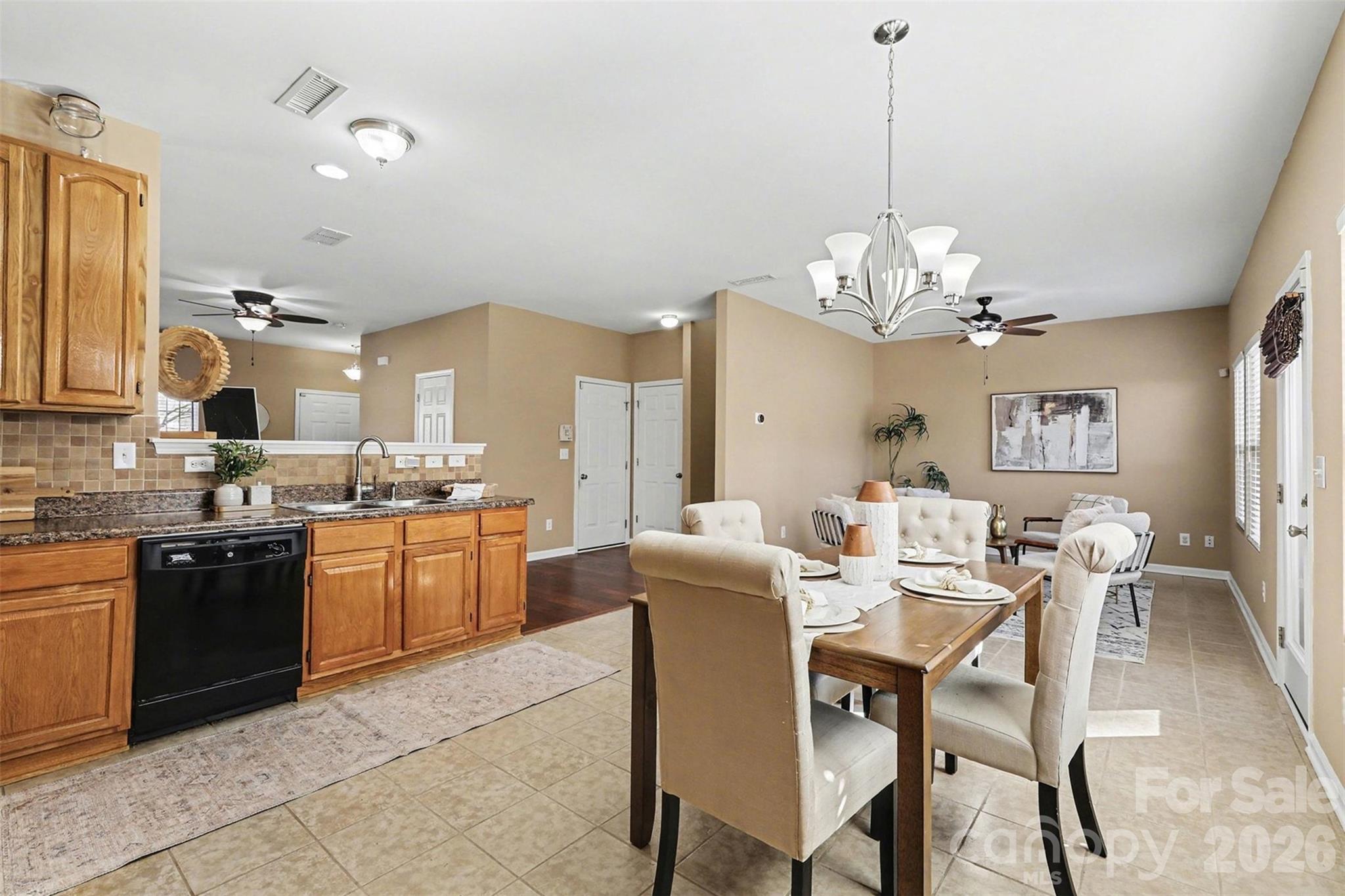 1806 Tradd Avenue Clover, SC 29710 - Photo 8 of 29 a large kitchen with a table and chairs