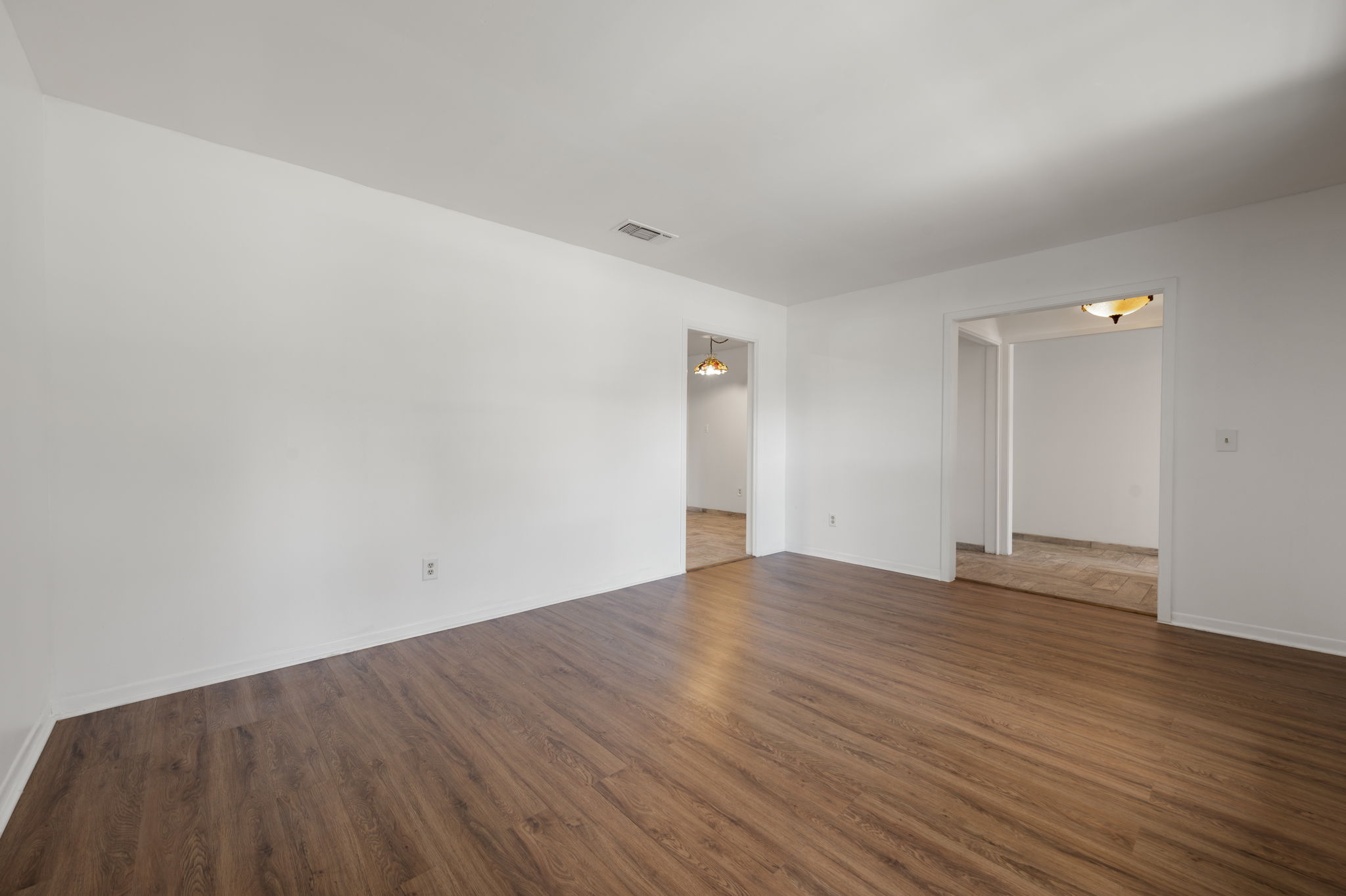 1400 Summit Circle Taylor, TX 76574 - Photo 16 of 39 a view of an empty room with wooden floor