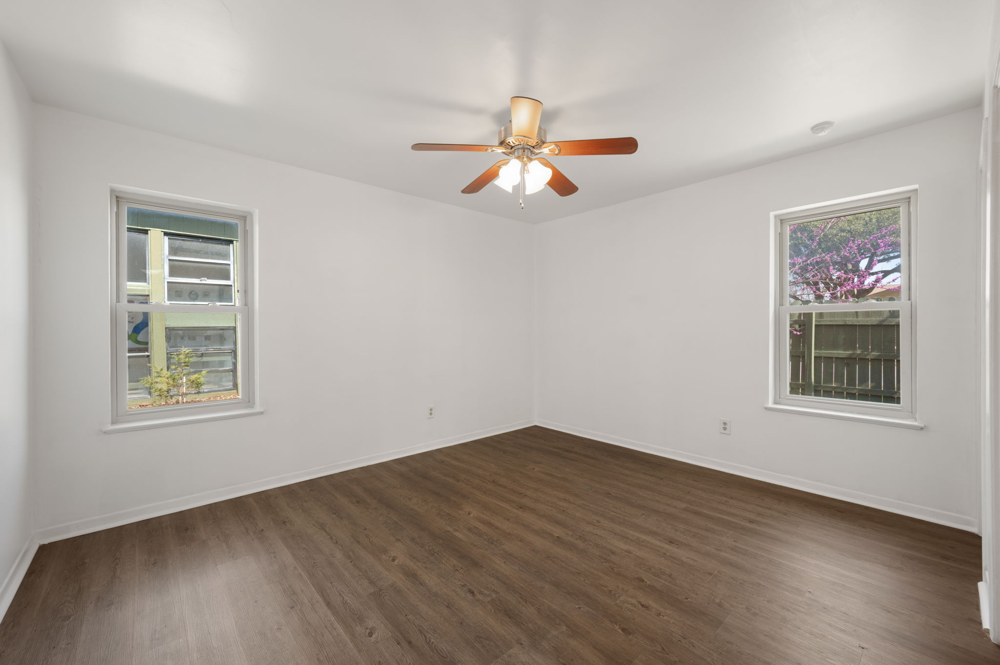 1400 Summit Circle Taylor, TX 76574 - Photo 18 of 39 a view of empty room with wooden floor and fan
