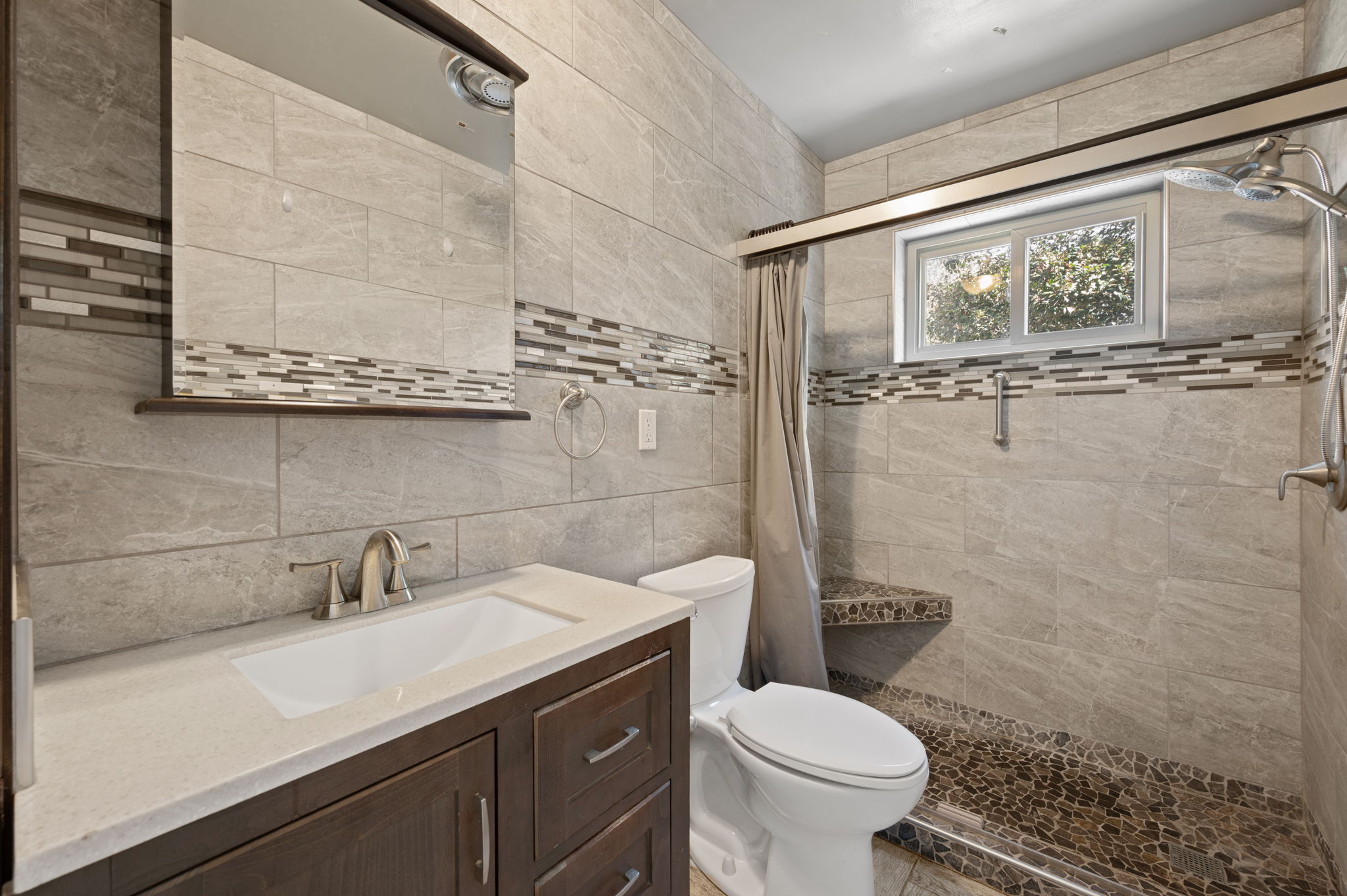 1400 Summit Circle Taylor, TX 76574 - Photo 24 of 39 a bathroom with a granite countertop toilet sink and shower