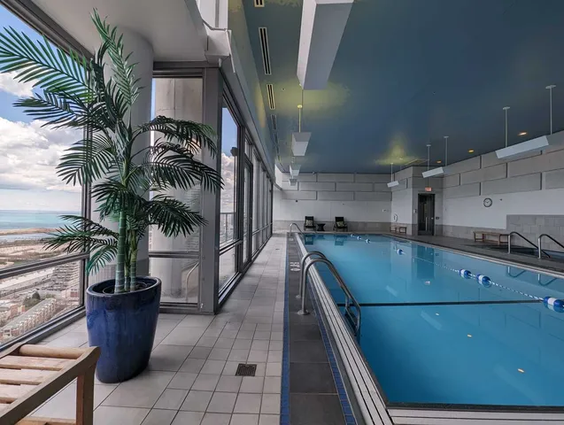 a kitchen with a sink and a refrigerator